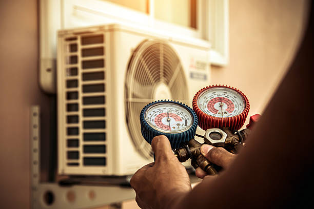 Professional Ac Installation technician working in Grand Junction, MI